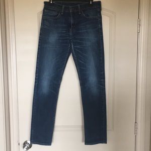 511 red label Levi Straus dark denim Jeans.